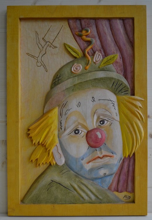 Relief: Trauriger Clown - farbig gefasst